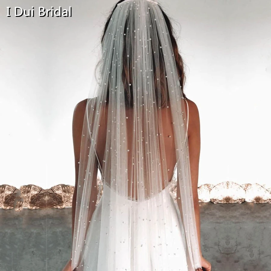 

Elegant Pearl Wedding Bridal Veil with Comb 1 Tier Cut Edge Fingertip Cathedral Length