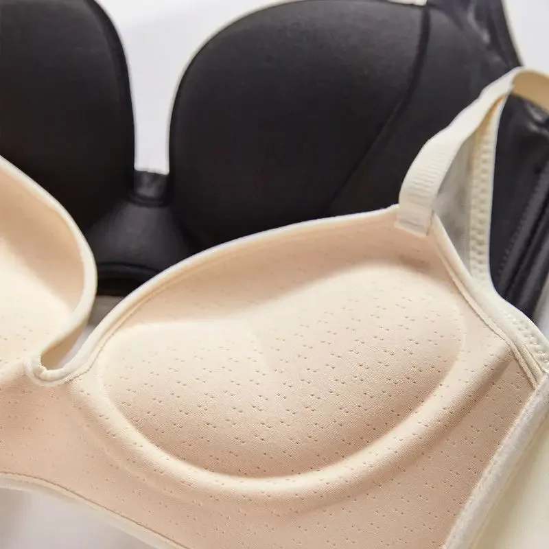Wireless T-shirt bra shown in black with smooth cups and supportive everyday shape