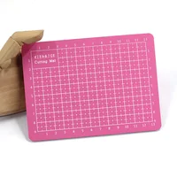 4 colorxiehaige 15*11Double-Sided PVC A6 Cutting Mat Multipurpose Self Healing Cutting Mats for Durable Paper Mat for Cutting 3