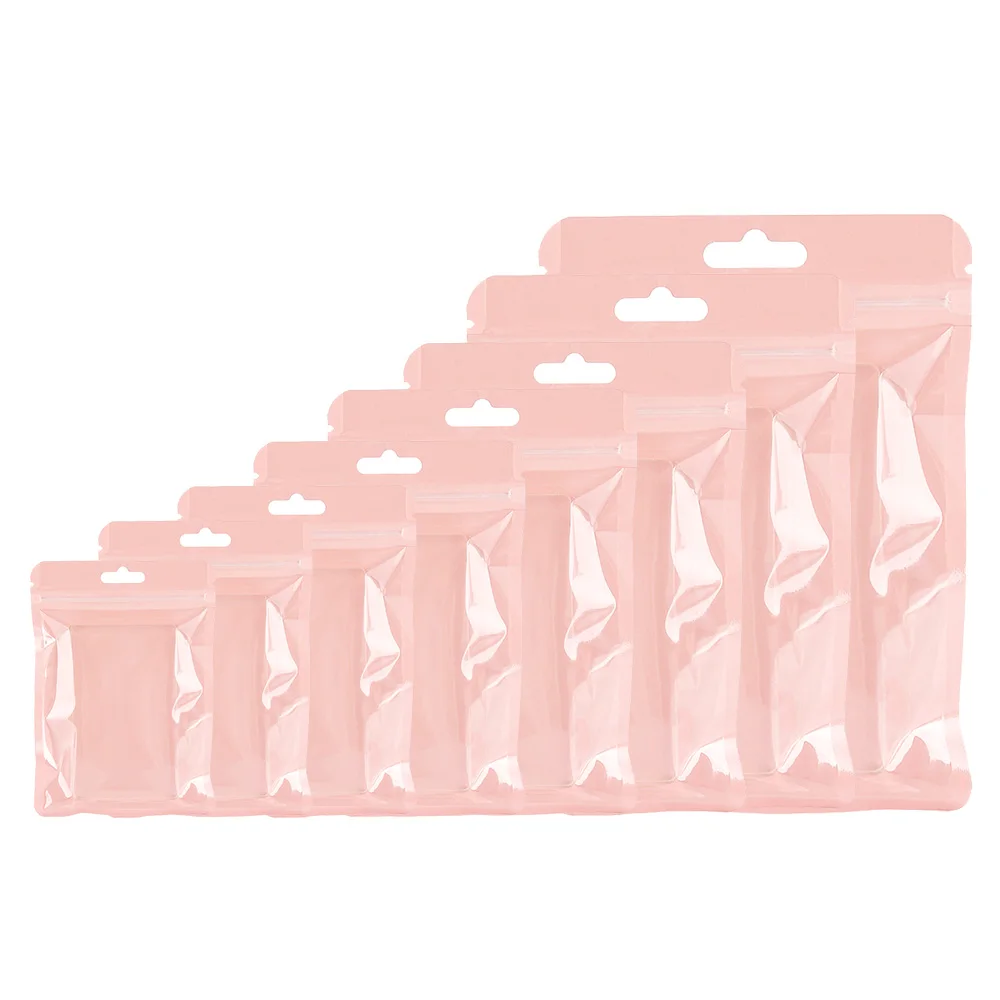 

100 шт. глянцевые экологически чистые розовые прозрачные передние косметические мешки из лавсановой фольги с застежкой-молнией и отверстием для подвешивания