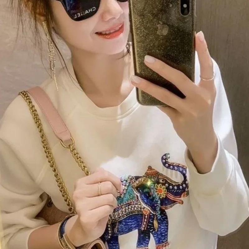 Women's Pullover Solid Color Round Neck Animal Printed Sweatshirts Autumn and Winter 2023 New Long Sleeve Loose Beading Tops