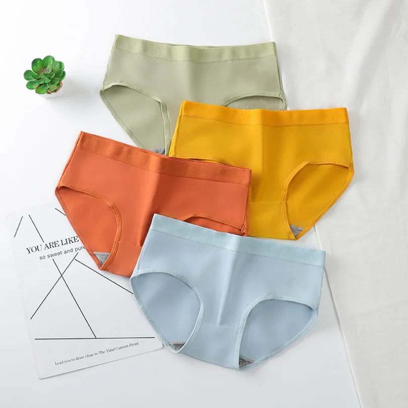 

New solid color non-marking mid-rise panties women's macaron comfortable breathable buttock lift sexy less ladies briefs