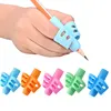 Pencil Handle Rod Grips pen Holder Grip for Kids Cute Hand writing Aid Trainer Posture Correction Pen Finger Holder 1