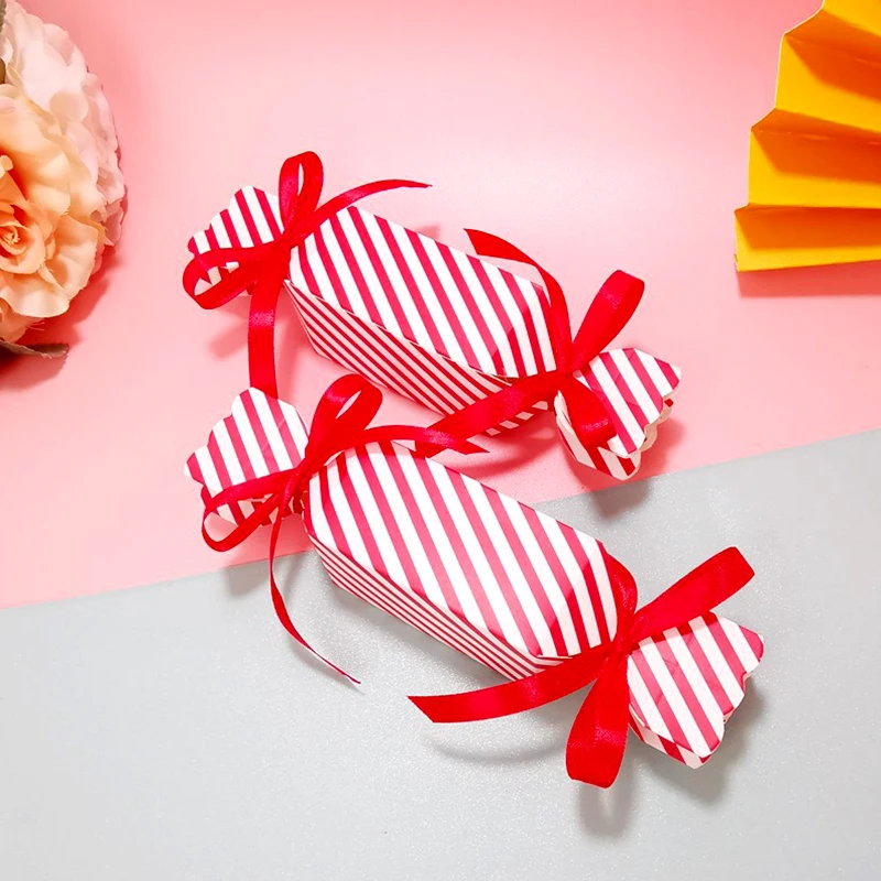 Description Picture 5 of item50Pcs Christmas Striped Candy Gift Box Craft Paper With Ribbons Wedding Favor Treat Bag Kids Birthday Cracker Box Xmas Packaging