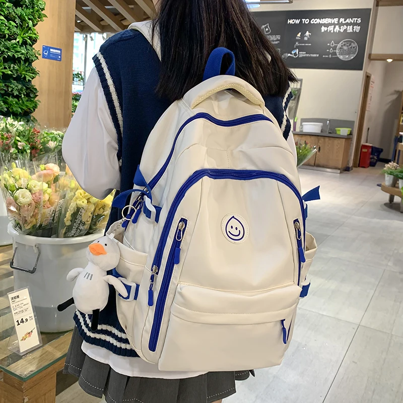 

Schoolbag female junior high school students high school students simple casual backpack light college students backpack female