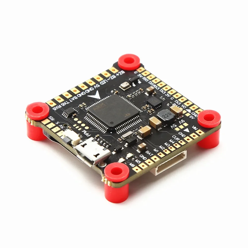 Connecteurs et ports de la carte Betaflight F4V3.1S pour drone FPV racing, avec baromètre et OSD visibles