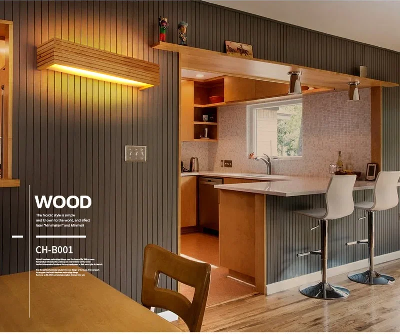 A contemporary kitchen featuring wood accents, a bar counter accompanied by two stools, and ambient lighting. The space is illuminated by Rectangle Wooden Wall Lights, accentuating the Scandinavian design with their natural wood finish. Text overlay details the wood paneling.