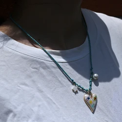 Handcrafted Knotted Rope Heart Pendant Necklace with Star and Pearl Accents - Fashionable Jewelry (Blue rope)
