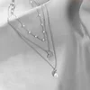 Collier Double couche étoile lune pour femmes, couleur argent, breloque délicate en Zircon, chaîne ras du cou en acier inoxydable, bijoux, nouvelle mode