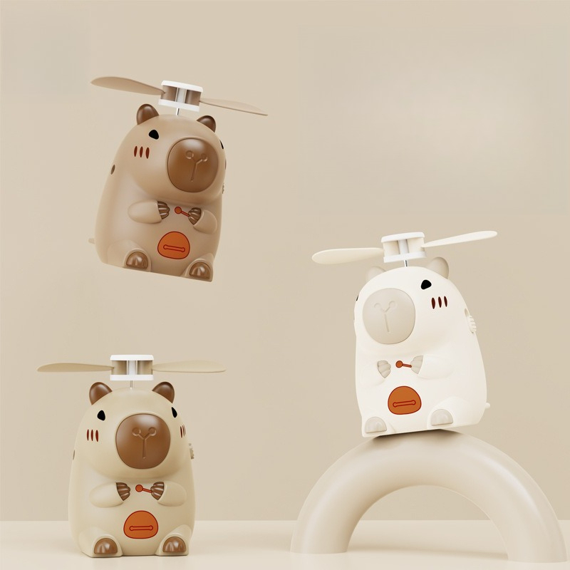 The Capybara Is Holding A Best-selling New Model of Fan, A Mini USB Portable High-power Office Fan and A Desktop Electric Fan