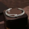 RAKOL Luxury MicroPaved Zircon Geometric Cross Splicing Open Bangles For Women Gold Color Adjustable Double Layer Bangle Jewelry 2