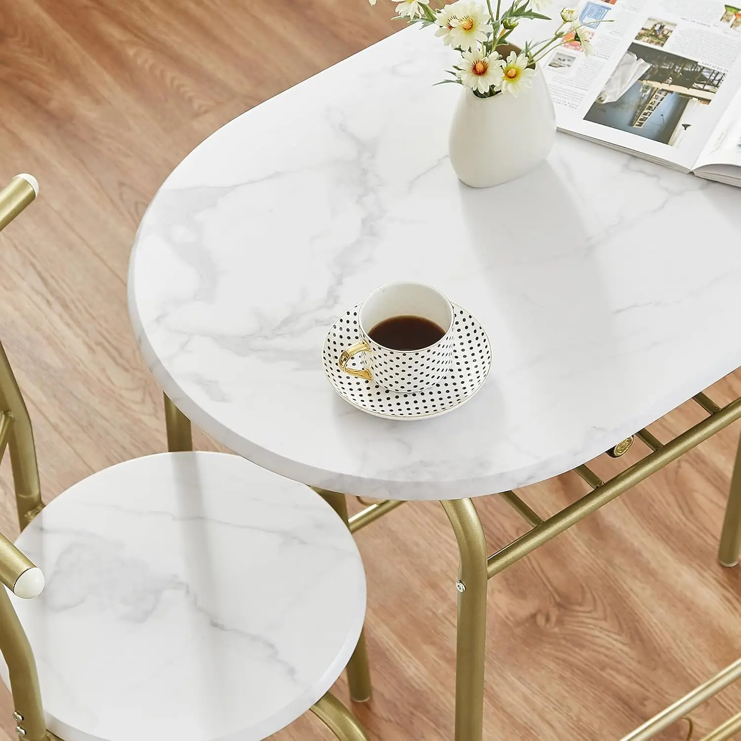 3-Piece Dining Table Set. Wood Grain Oval Tabletop. Metal Frame. Built-in Wine Rack. For Small Spaces. White & Gold.