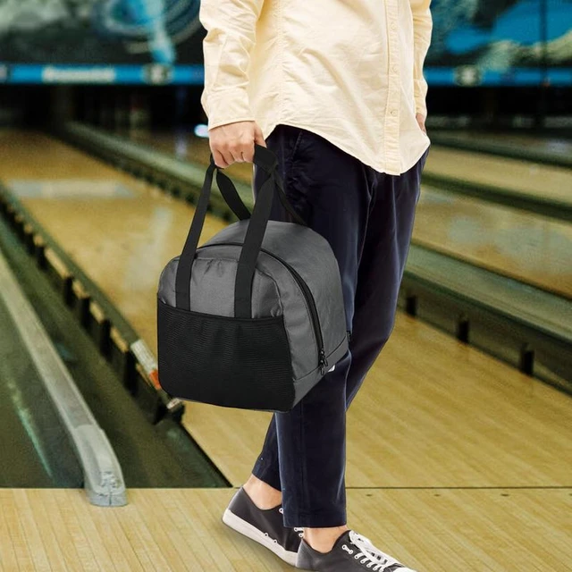 Bowling ball with bowling shoes in bowling bag - sporting goods