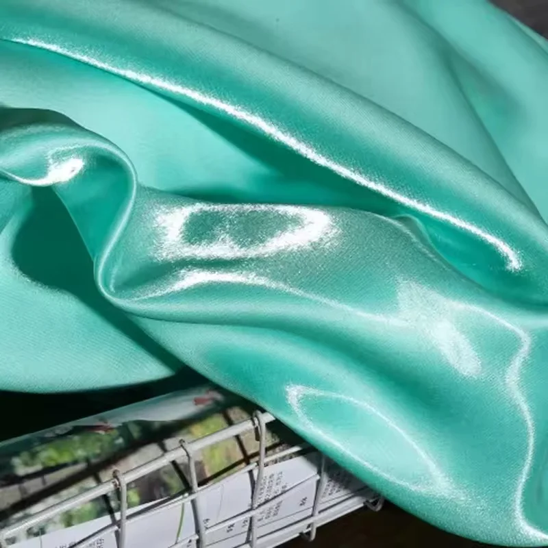 Blue Luxury Glossy Metallic Reflective Satin Fabric for Fashion and Formal Wear