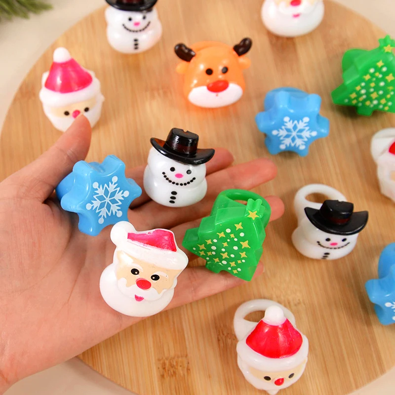 

Christmas Luminous Ring Cartoon Santa Claus Snowflake LED Flash Finger Ornaments Christmas Party Decoration Gift Kids Glow Ring