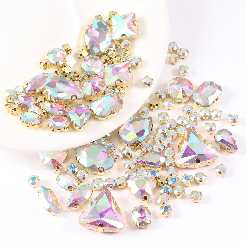 thumbnail image 1 of Lote de 130 diamantes de imitación de cristal con engaste de garra dorada, de formas variadas, para coser sobre piedras de cristal, para vestidos de boda, zapatos, bolsos, adornos DIY, 1 of 5