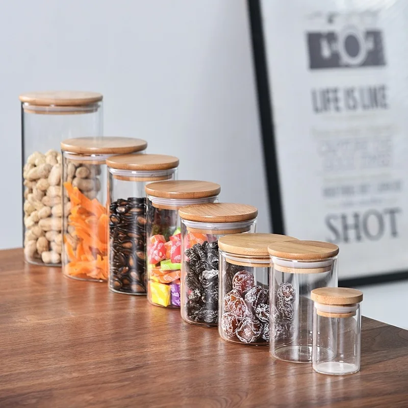 https://ae01.alicdn.com/kf/Sdd21348b0c1440029a5cc454ba14f628v/High-Borosilicate-Transparent-Glass-Sealed-Storage-Jar-with-Bamboo-Lid-Multi-grain-Snacks-Candy-Storage-Kitchen.jpg