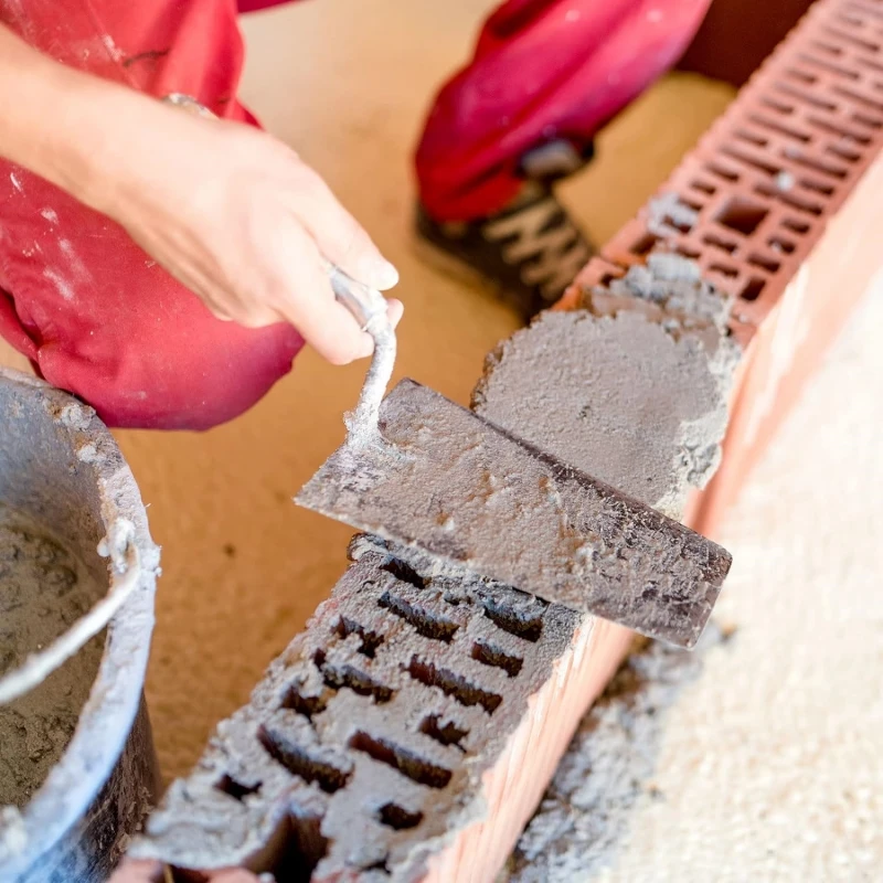 Enhanced Rubber Grip Carbon Steel Plaster Trowel for Construction and Repair Tasks
