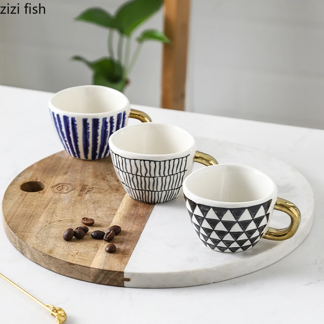 Tazza da caffè in ceramica al latte modello geometrico da tavolo
