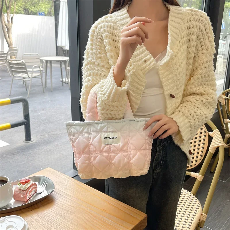 

New large capacity bag handbag student book commuter woman advanced sense makeup bag bento bag