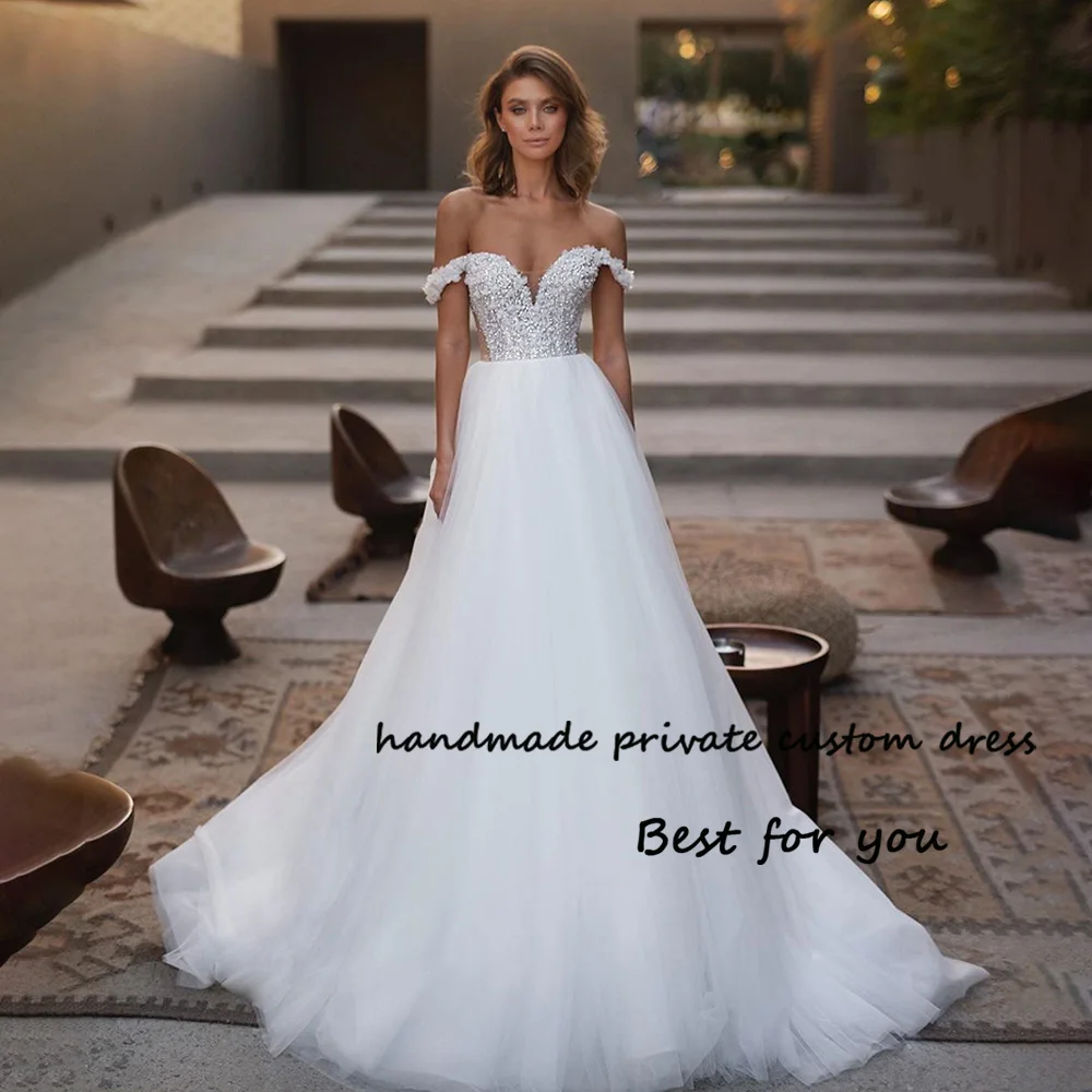 

White Tulle A Line Wedding Dresses Off Shoulder Beads Corset Sweetheart Bridal Gowns with Train Beach Wedding Gowns