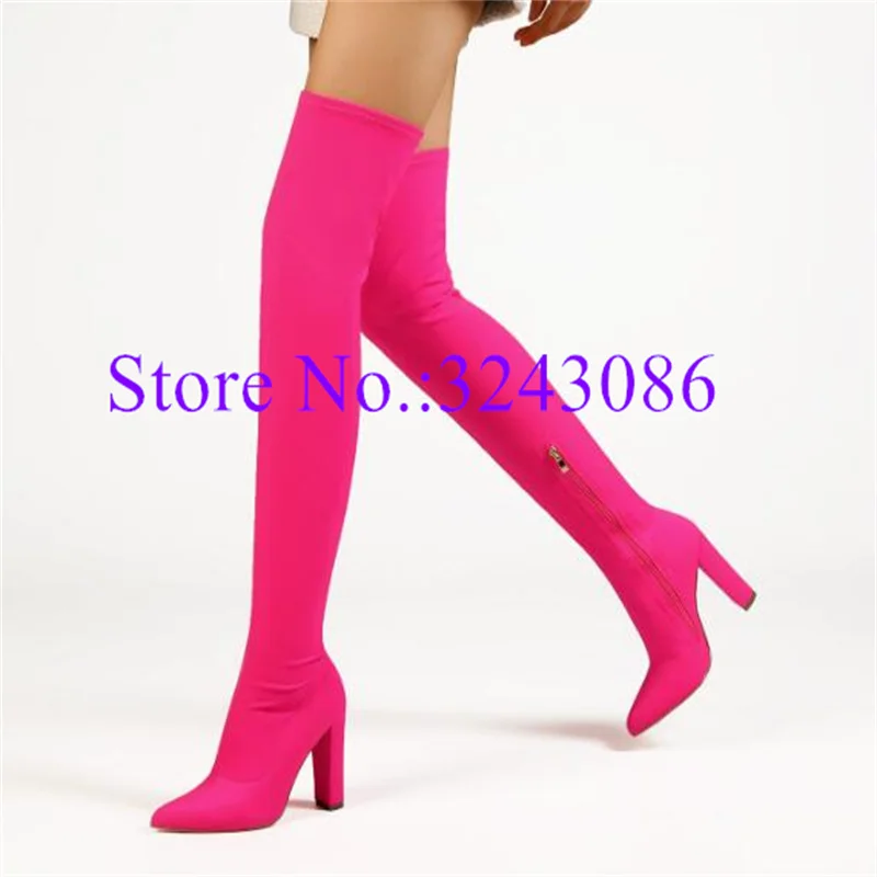 

Женские сапоги выше колена на массивном каблуке, с острым носком