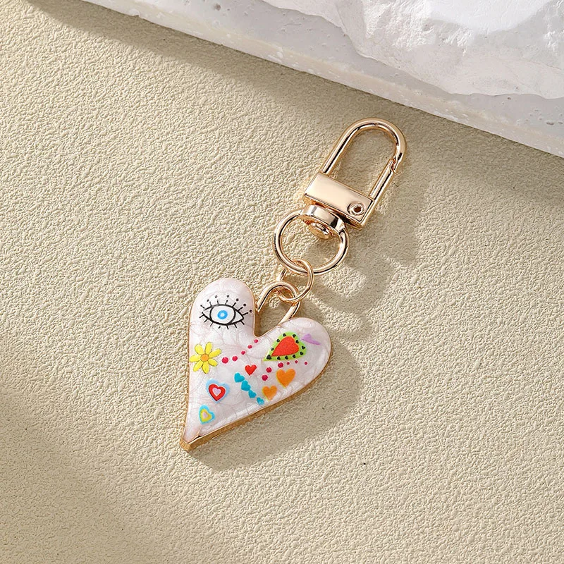 Neue gedruckte Tropf öl Teufels auge Schlüssel bund für Frauen Mode Blume Herz Gold Farbe Schlüssel Schnalle Tasche Kopfhörer Fall Schmuck Geschenk – Detail 6