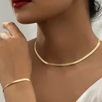 Joyierre Mujer الذهبي الفولاذ المقاوم للصدأ ثعبان العظام سلسلة قلادة الهيب هوب شيك المرأة أسلوب بسيط قلادة سوار مجموعات مجوهرات بالليزر 1