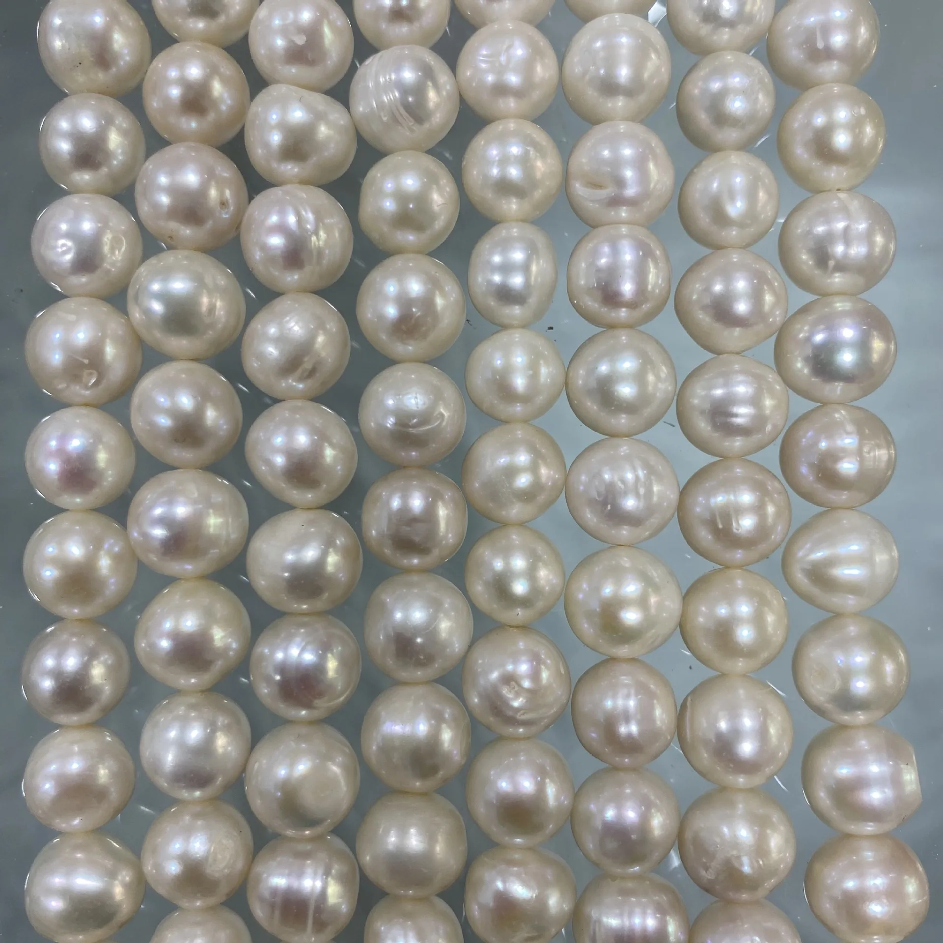 

9-10mm cultured natural white color near round shape freshwater potato pearls strand