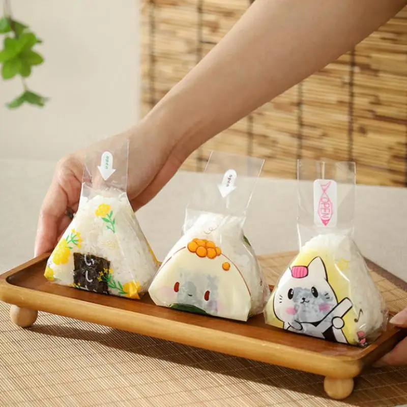 새로운 100Pcs 스시 가방 사랑스러운 일본 삼각형 쌀 공 일회용 포장 가방 스시 만들기 금형 도시락 액세서리