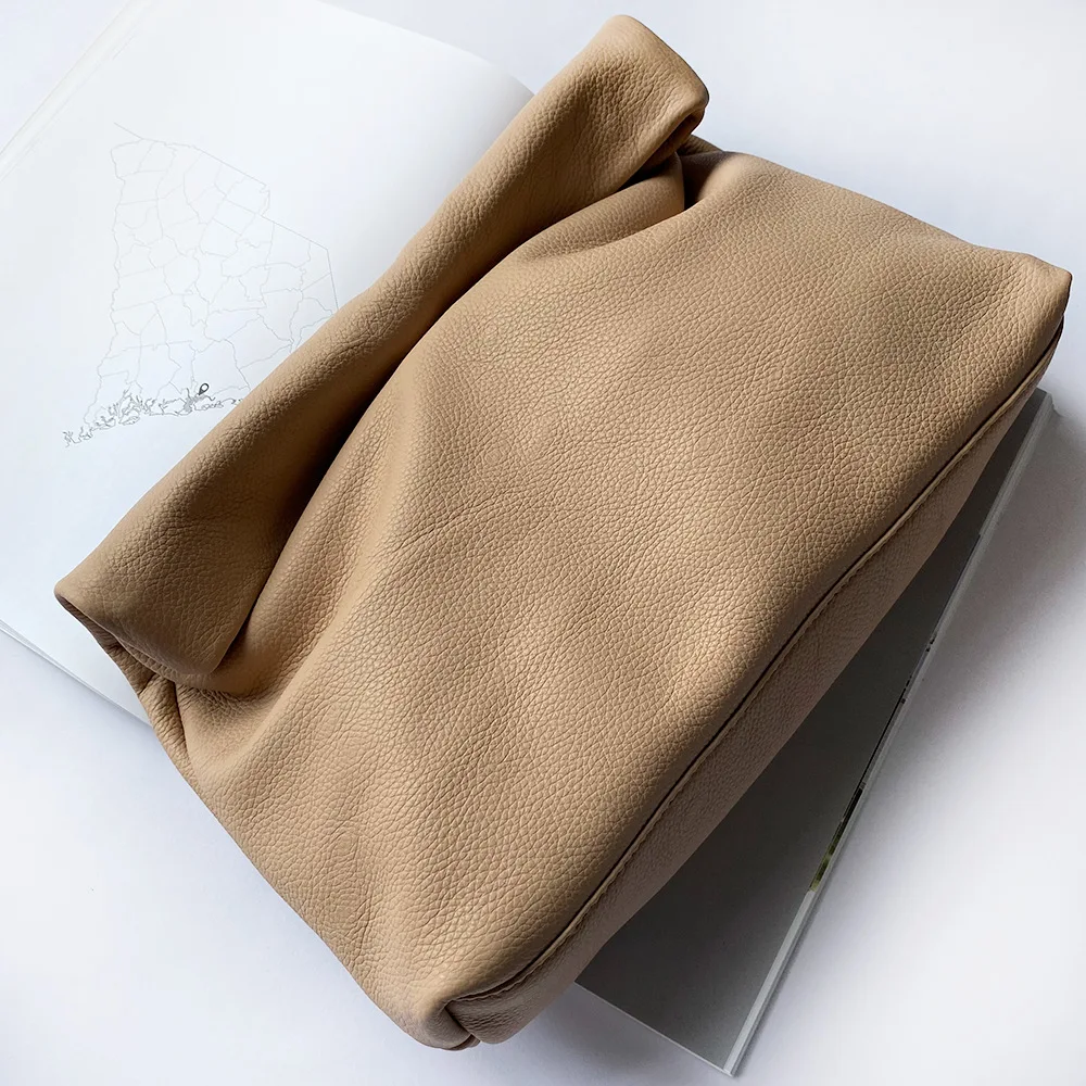 Personality roll-edge leather bag floral decoration
