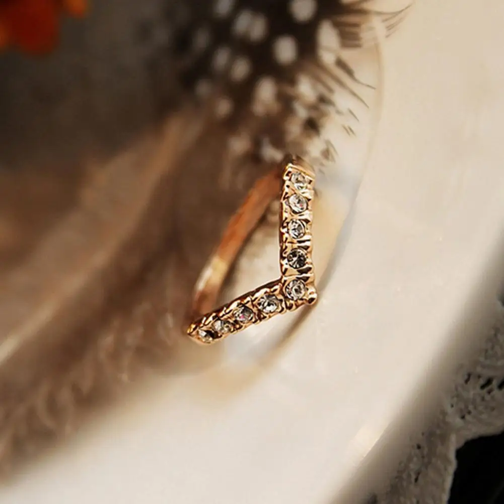 Gold tone cz ruby-white v shape vanki finger ring dj-40600 – dreamjwell