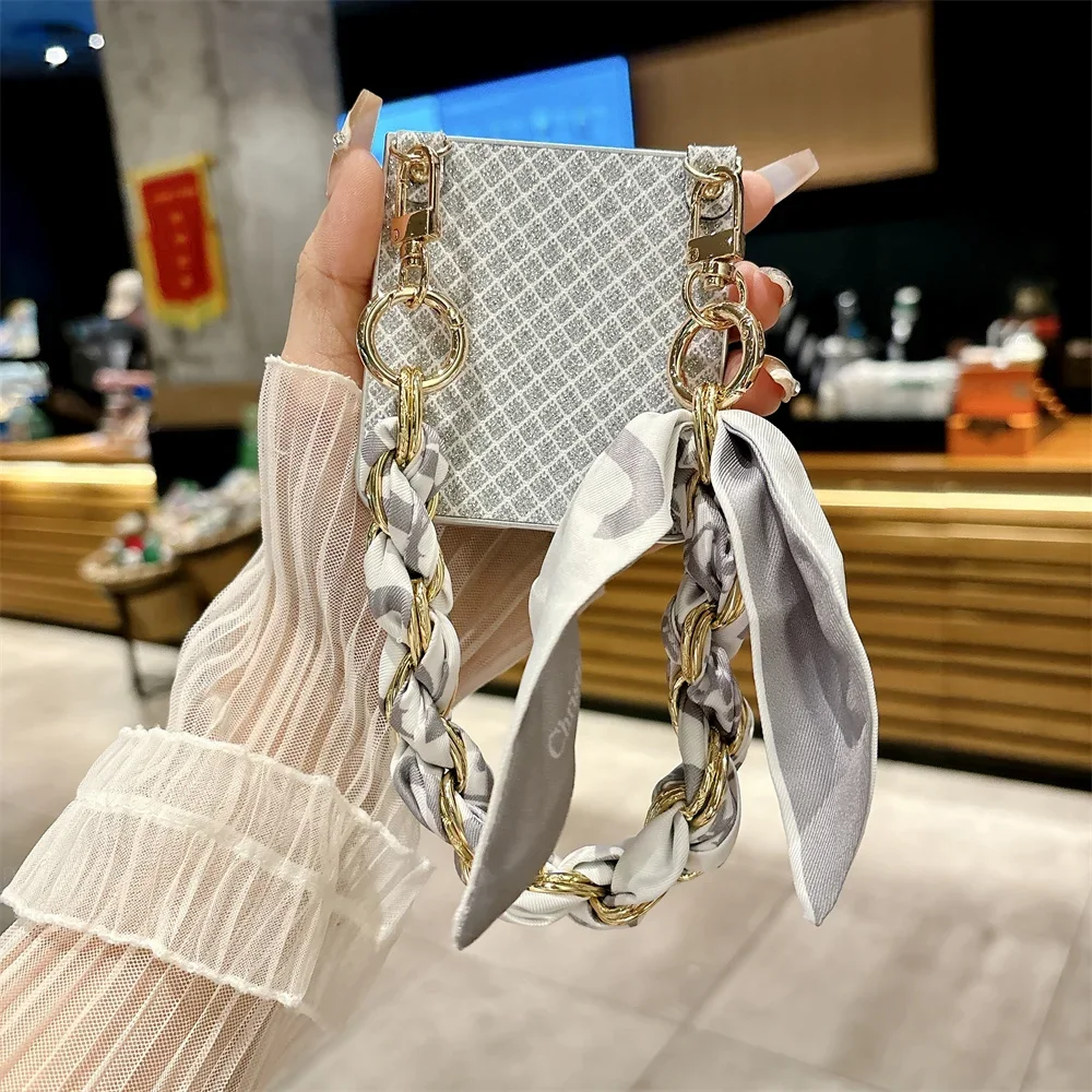 Luxurious Leather Protective Phone Case with Elegant Silk Wrist Strap