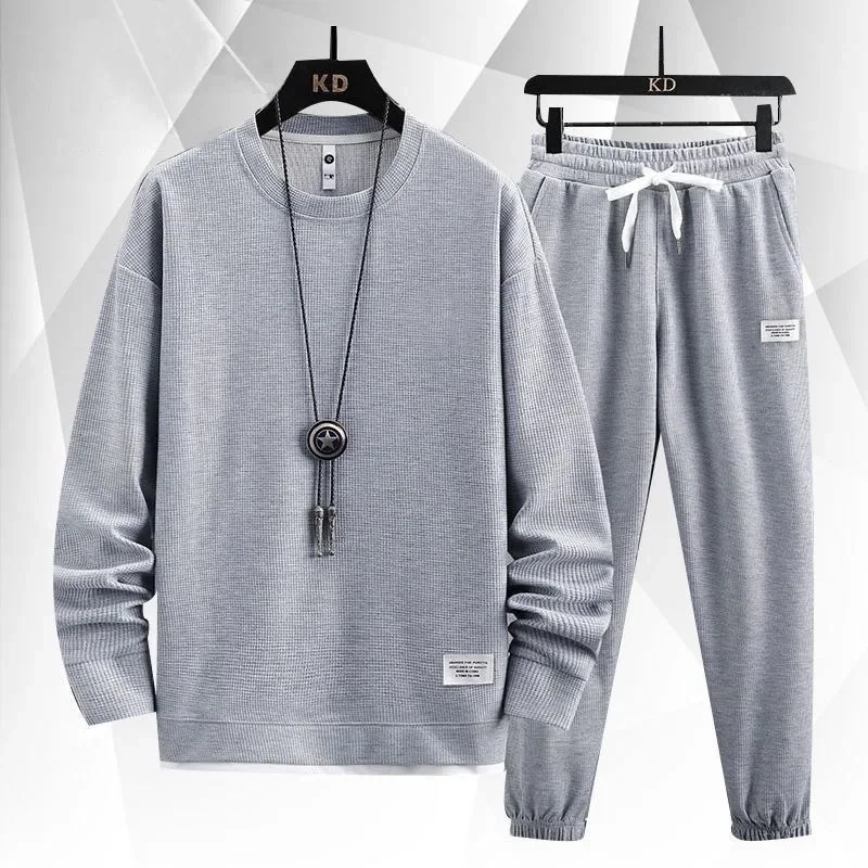 طقم رجالي رياضي كاجوال بأكمام طويلة فضفاض مناسب للخريف والشتاء مقاس كبير لون نقي مريح للتنفس طقم عصري