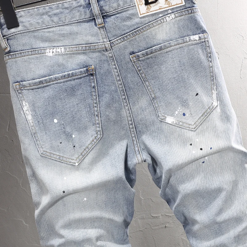 Street Fashion Men Jeans Retro Light Blue Elastic Stretch Slim Fit Ripped Jeans Men Painted Designer Hip Hop Denim Pants Hombre