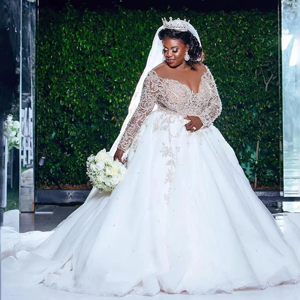 Luxury Wedding Dress Sexy Long Sleeves Sheer O Neck Beading Rhinestones Ball Gown Sweep Train South Africa Bridal Dresses