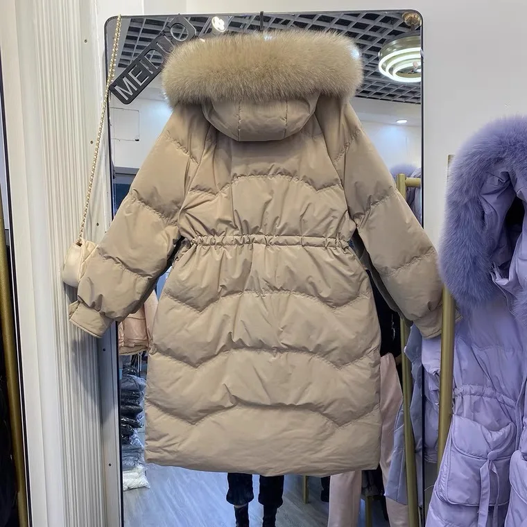 Рисунок 4 - Женский длинный пуховик на белом утином пуху