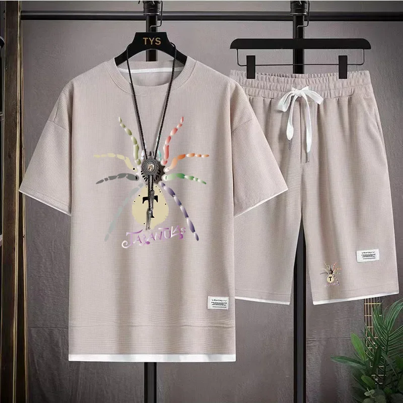 Conjunto deportivo informal de marca de moda de verano para hombre con pantalones cortos holgados de manga corta y cuello redondo, conjunto de dos piezas con diseño de gofre, conjunto de versión corea