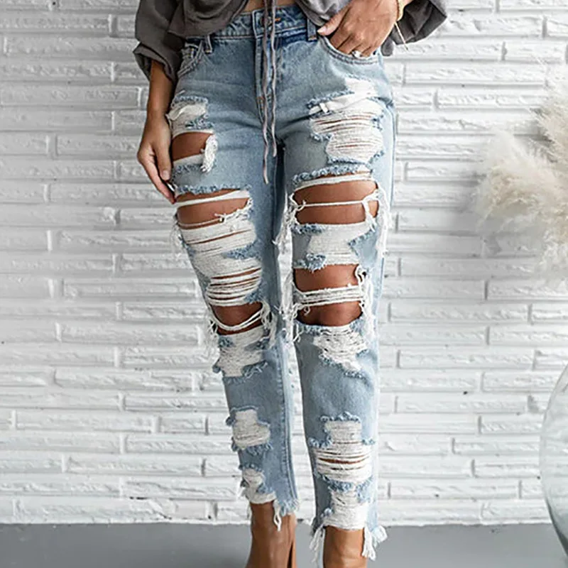 Fashion Street Hipster Wind Hole Worn Tassel Women's Jeans