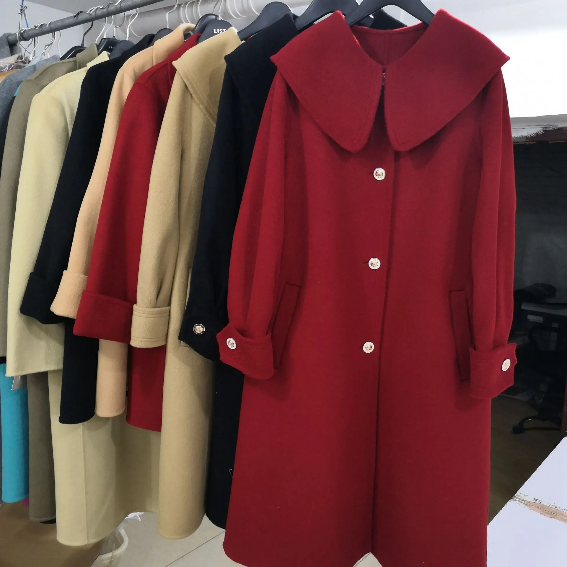 

2023 Korean version new doll neck double-sided hand sewn cashmere coat women's medium length loose and slimming wool coat