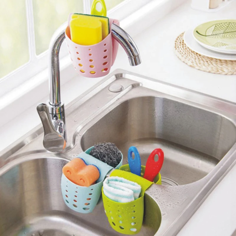 https://ae01.alicdn.com/kf/Sde0002ceec104474888eb691e2a4b295z/Kitchen-Sink-Storage-Drain-Basket-Sink-Holder-Adjustable-Soap-Sponge-Shelf-Double-Saddle-Style-Drain-Rack.jpg