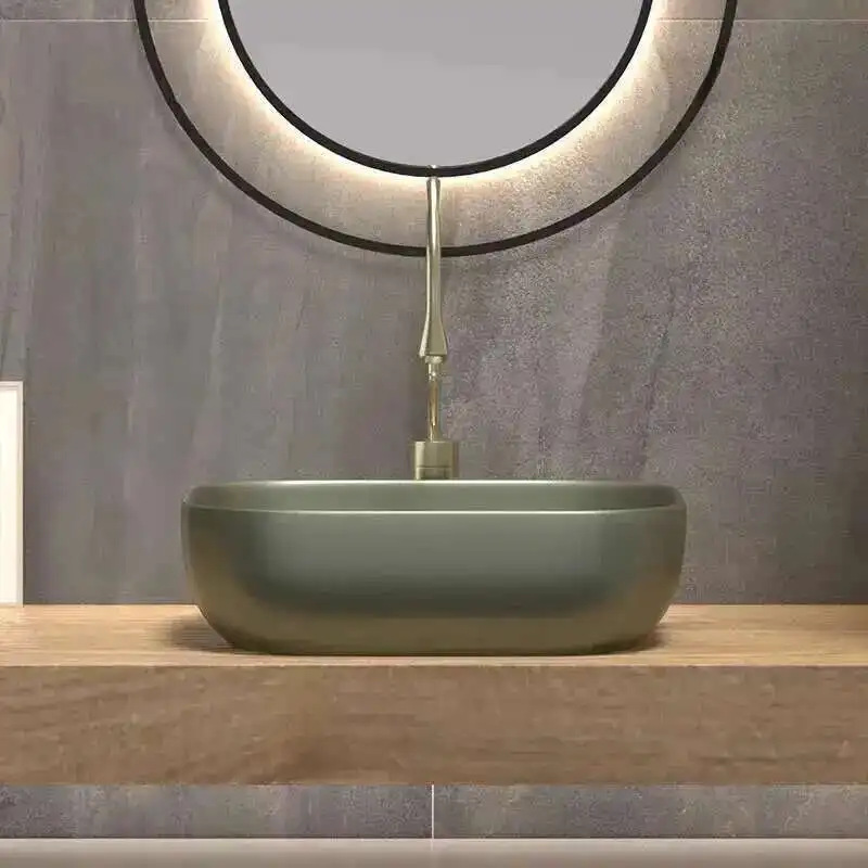 Simple อ่างล้างจานเซรามิคสําหรับห้องน้ํา Nordic High-end ลึกเหนือเคาน์เตอร์อ่างล้างหน้าหรูหรารูปไข่อ่างล้างจานห้องน้ําสําหรับระเบียง 1