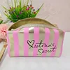 Portable striped makeup bag, small size, high-value handbag, mini portable makeup storage bag, waterproof women's bag cs013 4