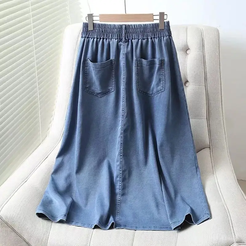 

2023 Spring All-match Fashion Elastic Waist Long Skirts for Women Solid Color Single Breasted Pockets Korean Style Denim Skirt