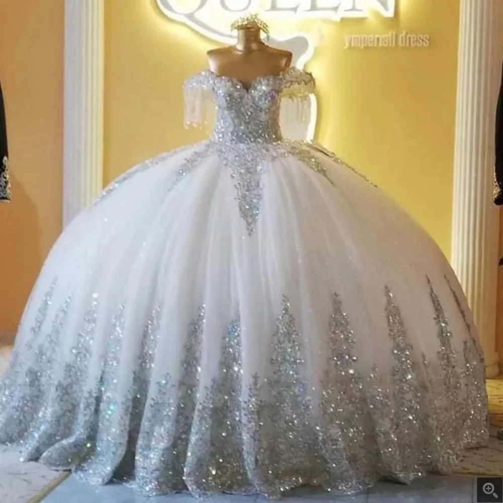 

Sparkly Silver Sequined Appliques Ball Gown Quinceanera Dresses Off The Shoulder Tassel Sweet 16 Prom Dress Vestidos De 15 Años