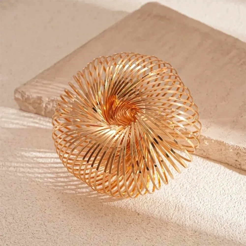 Round Shape Elastic Bracelet Geometric Design Exaggerated Style Hollow Out Bracelet Spring Mechanism Flat Wire Metal Bracelet