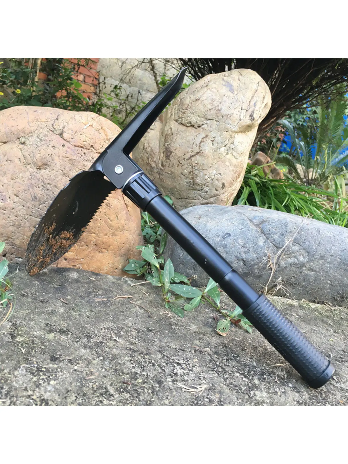 Four in one multifunctional folding shovel for outdoor survival and camping - durable stainless steel with saw, pickaxe, and bot