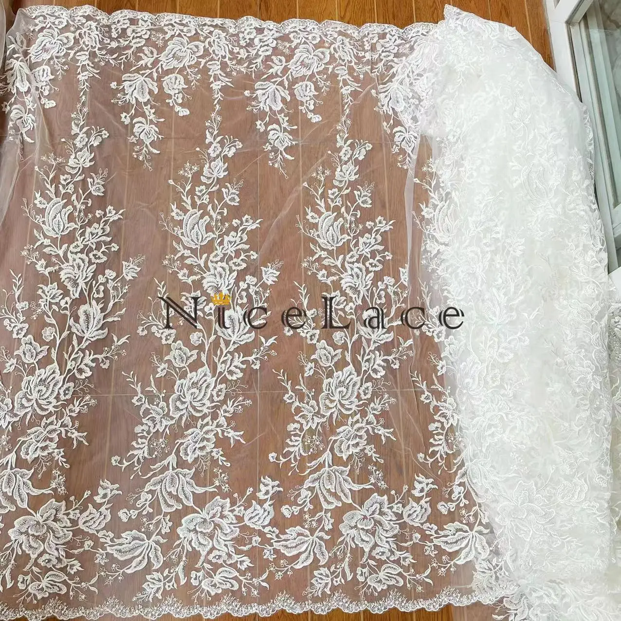 

2022 Nicelace Hot Sell Best Quality White Color Soft Tulle Floral Embroidery Lace Fabric With Sequins For Bridal Wedding Dresses