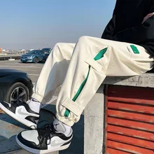 

Casual pants Men's spring pants men's leg pants Men's trend Loose straight, versatile side stripe sports men's pants
