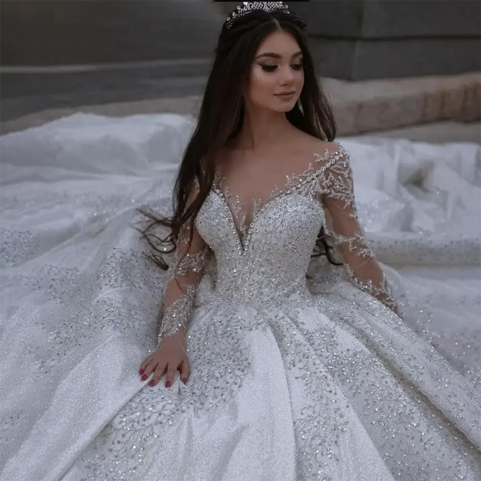 Customized New Luxurious Crystal Sequin Beaded Ball Gown Satin Wedding Dress Illusion Long Sleeves 2026 Court Train Bridal Gowns